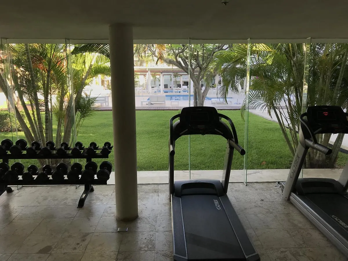아파트호텔 Magia Beachside Condo 신데 델 카르멘